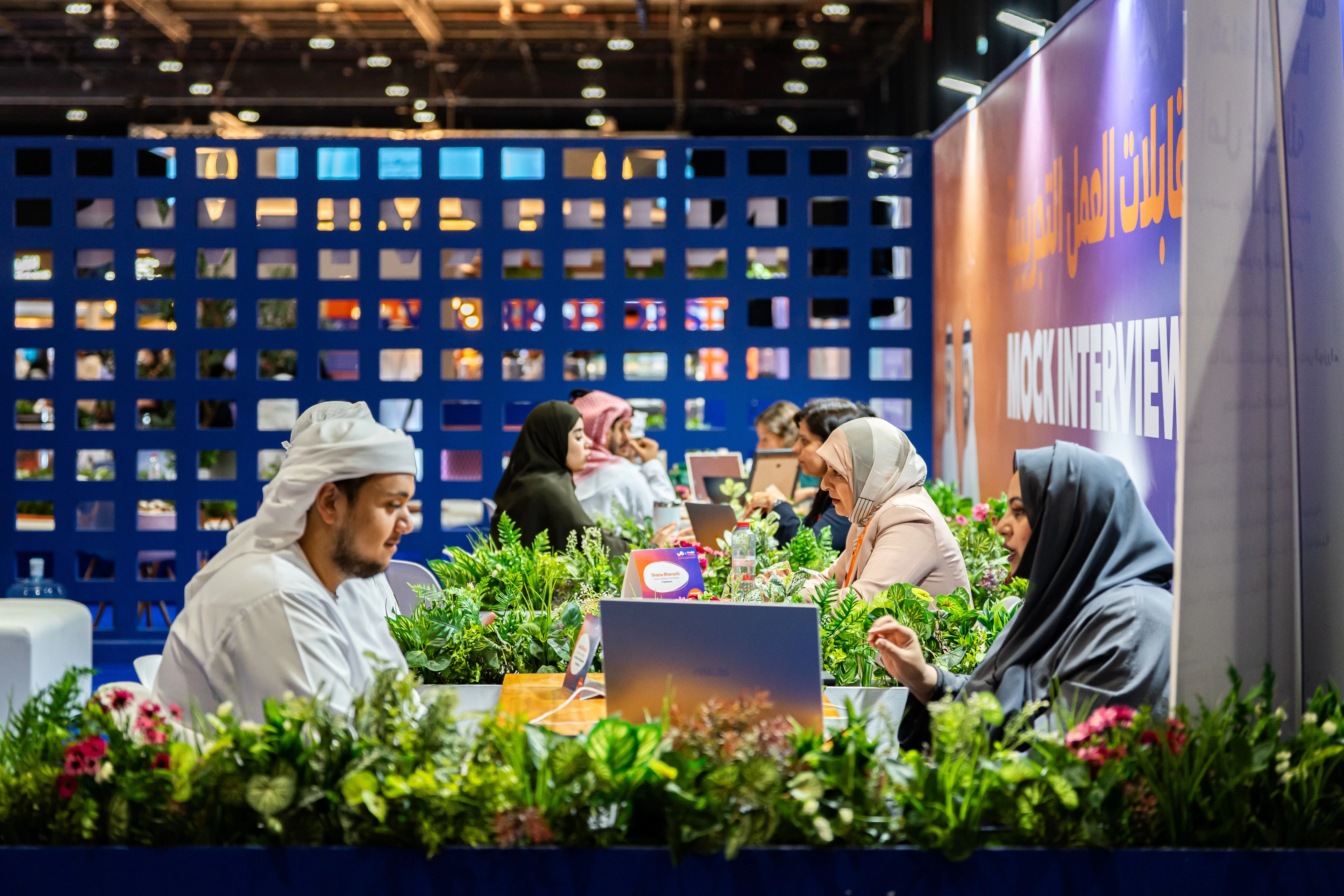 HR experts providing CV and interview feedback to Emirati candidates during Tawdheef x Zaheb 2025 in Abu Dhabi
