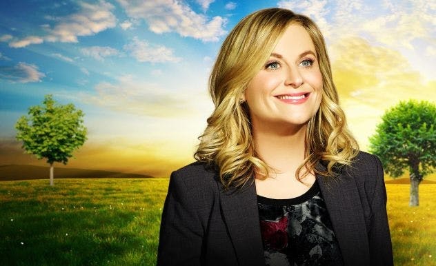 Leslie Knope from Parks & Rec posing with a landscape background