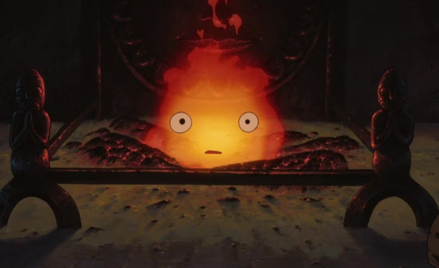 Sitting in a wood burning fireplace, Califer glows against the dark and ashy backdrop.