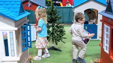 Two kids play in the Family Zone