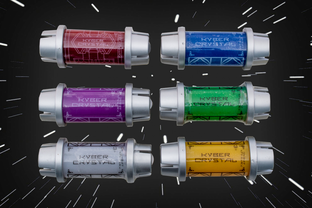 A line up of small futuristic looking tubes coloured (L-R) Yellow, Red, White, green, Purple, Blue