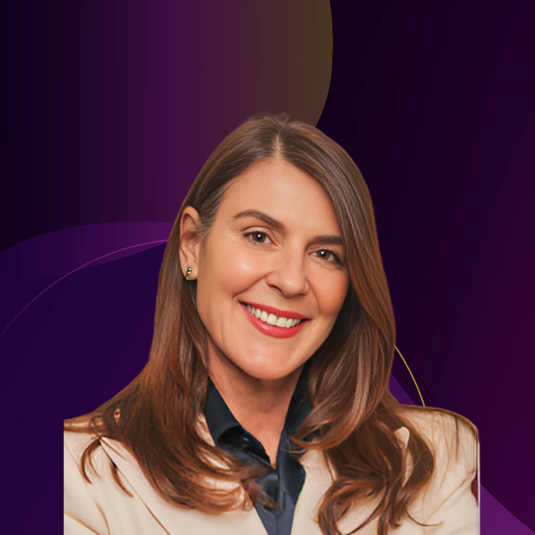 Portrait of Herminia Ibara against a dark purple background