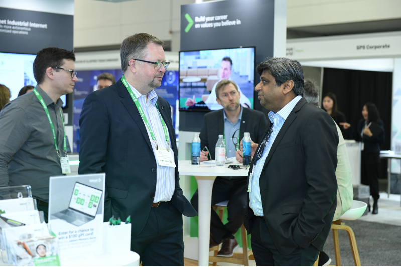 Exhibitor Chatting to Visitors