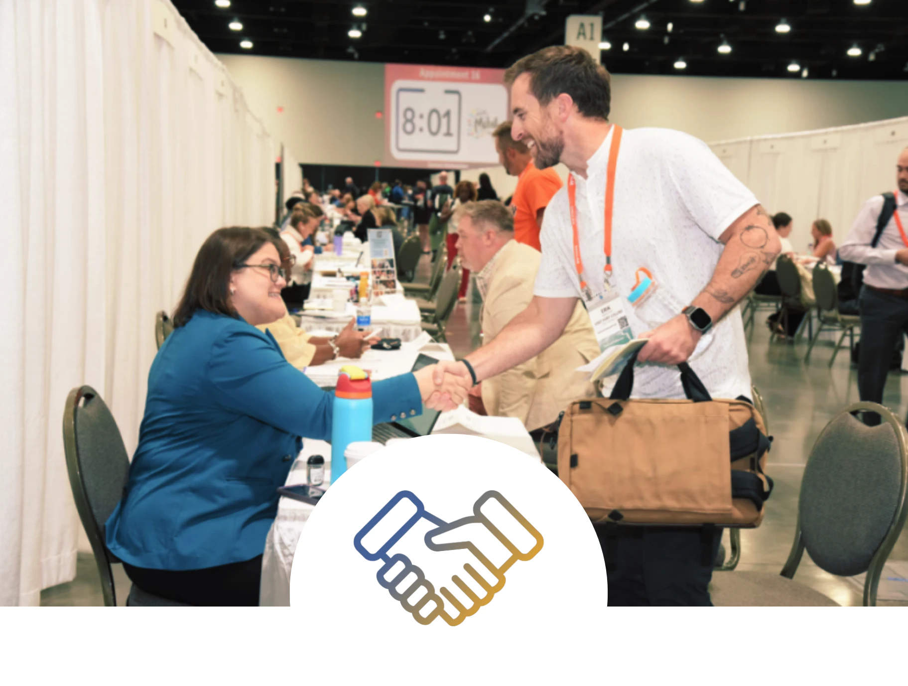 Two men taking marketplace appointments at a Connect event.