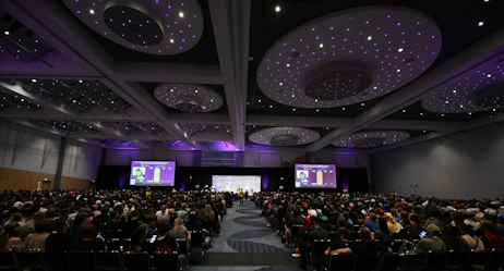 The ceiling looks like stars over the packed house for An Evening With Hayden Christensen. Moderators play a game with the audience ahead of the panel