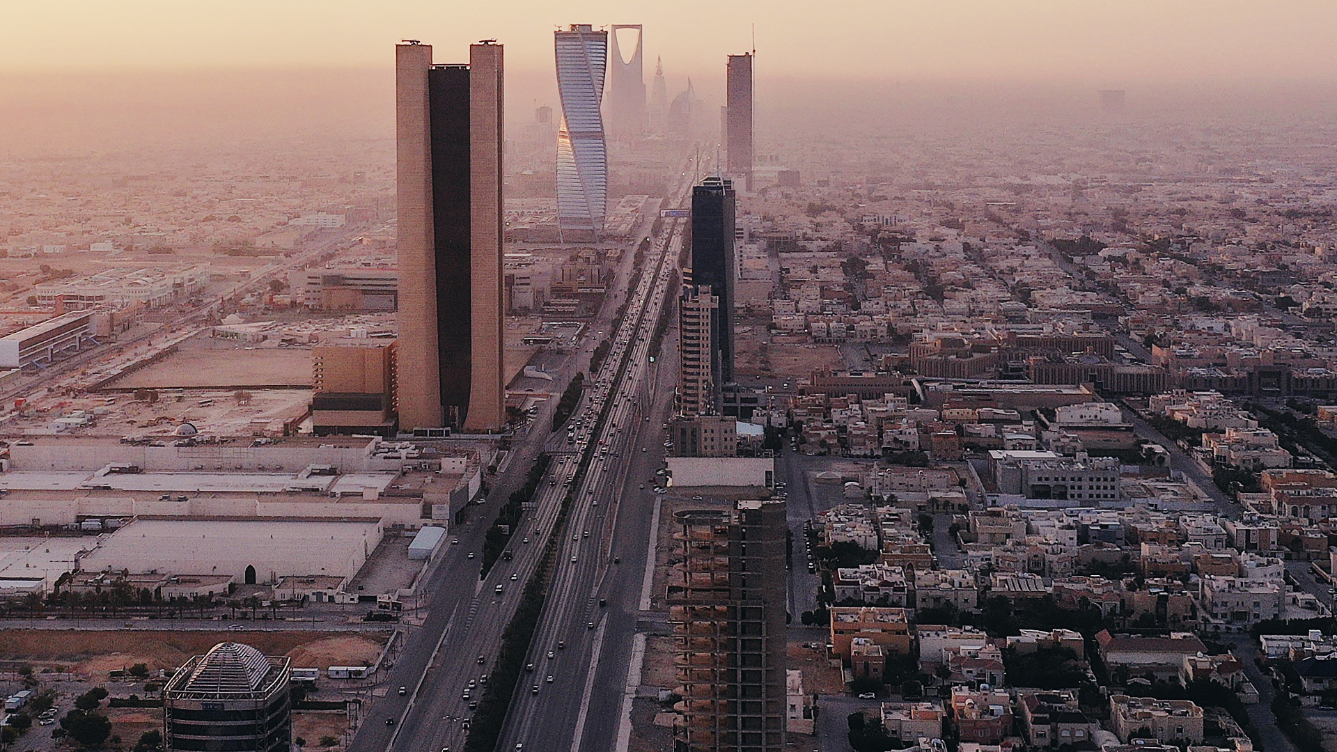 The Jeddah City Skyline with several landmarks across a main road