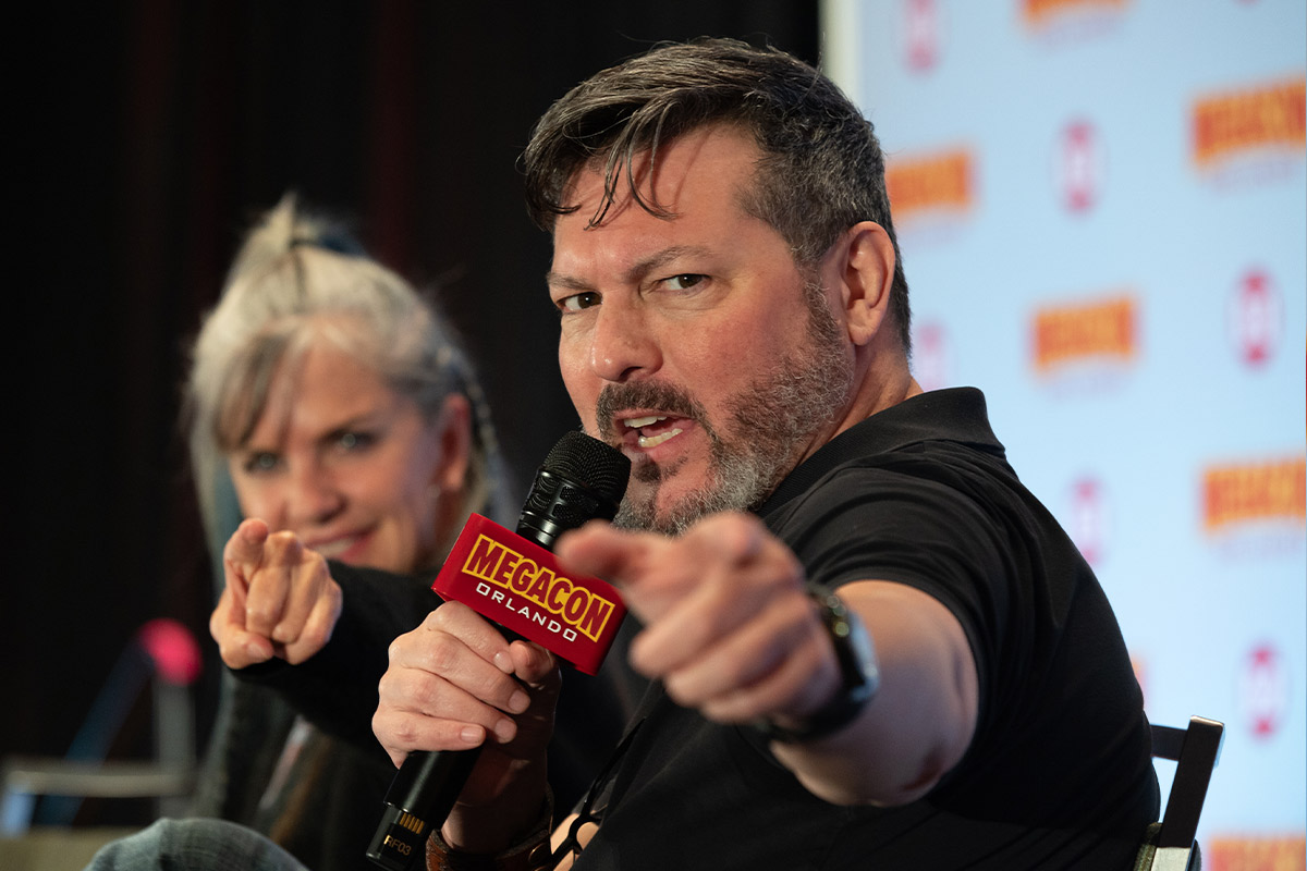 David Hayter points at the camera with a fake aggressive look on his face