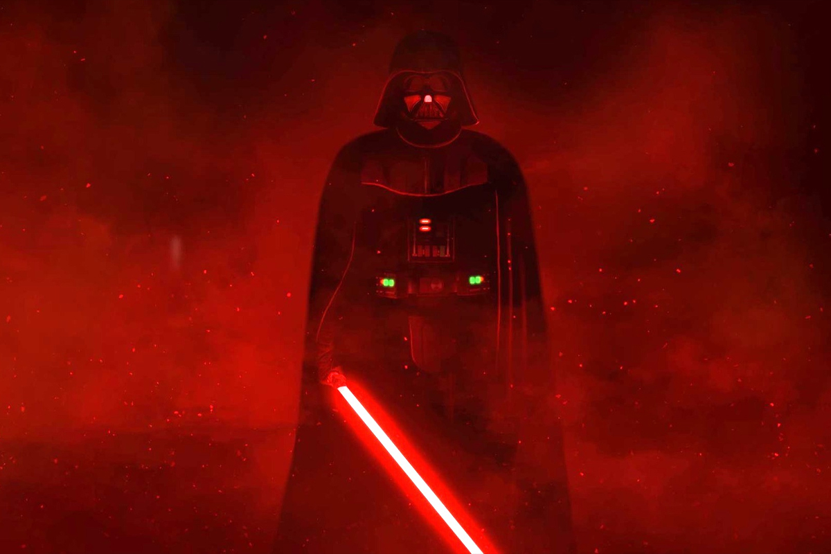 Darth Vader in a dark room with smoke lit red around him holding an ignited red lightsaber