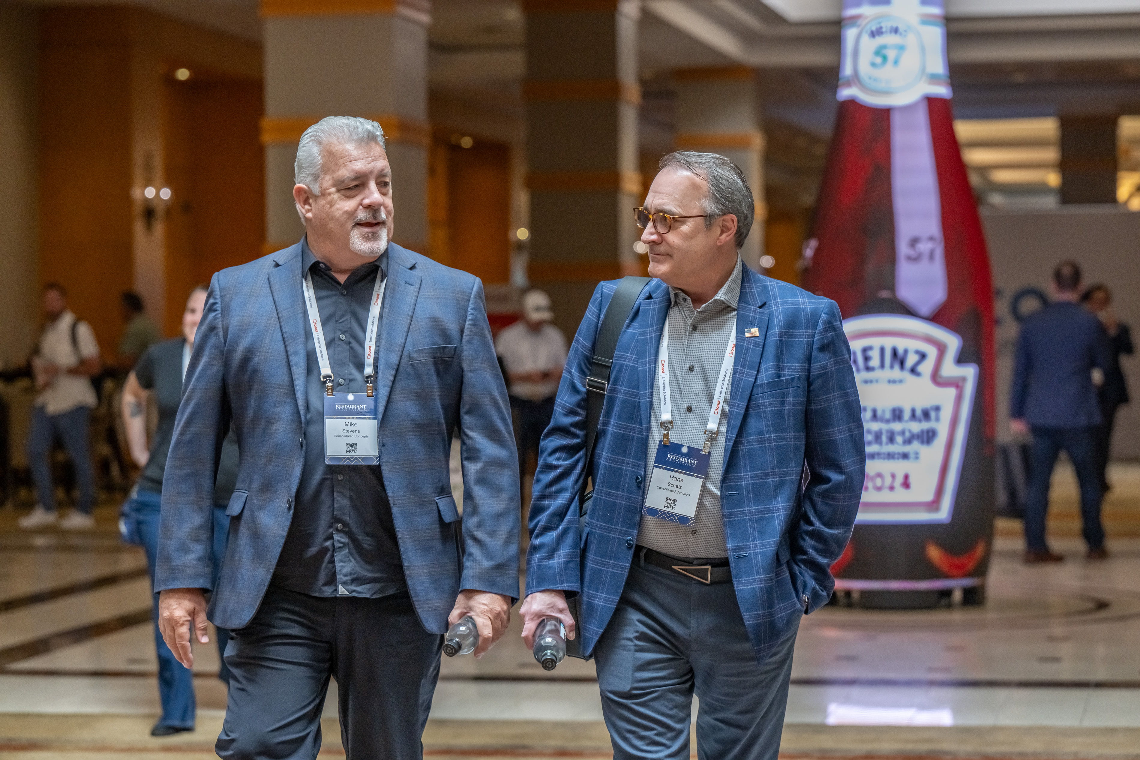 Image of attendees talking.