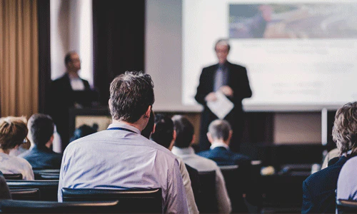 Speaker presenting during a general session.