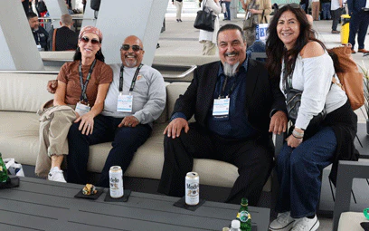 Group sitting down and taking photo at the Public Sector Reception