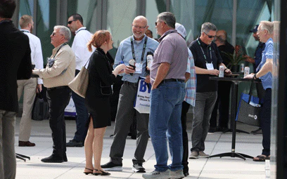 Groups of attendees networking at the public sector reception