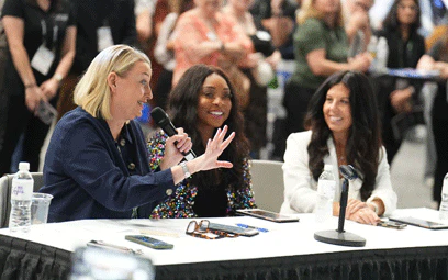 Judges talking with microphone at Trashion
