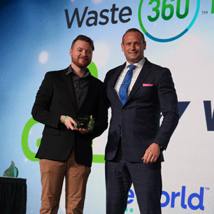 WasteExpo attendees taking a video in a 360 booth