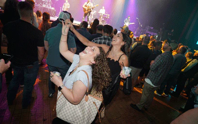2 people dancing on the welcome reception dance floor