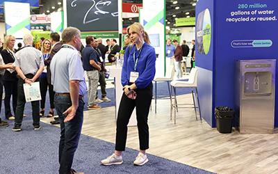 Attendee and Exhibitor Talking