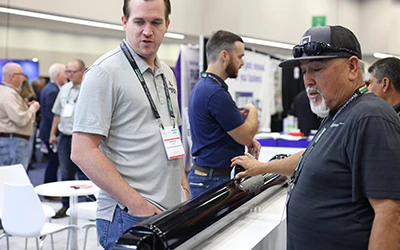 Attendee Reviewing Product