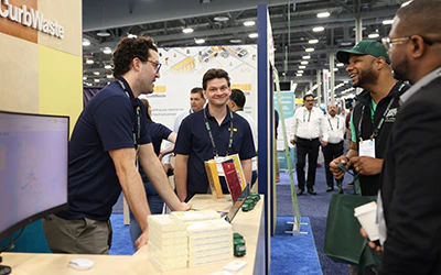 Attendees at Exhibitor Booth