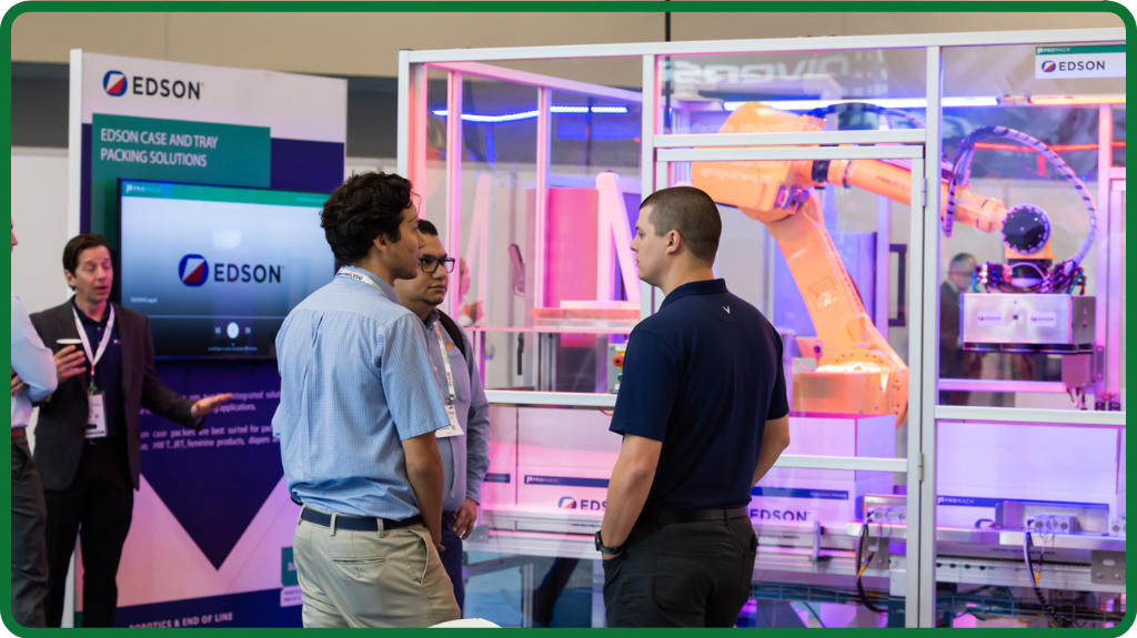 Exhibitors Speaking With Visitors at Tissue World