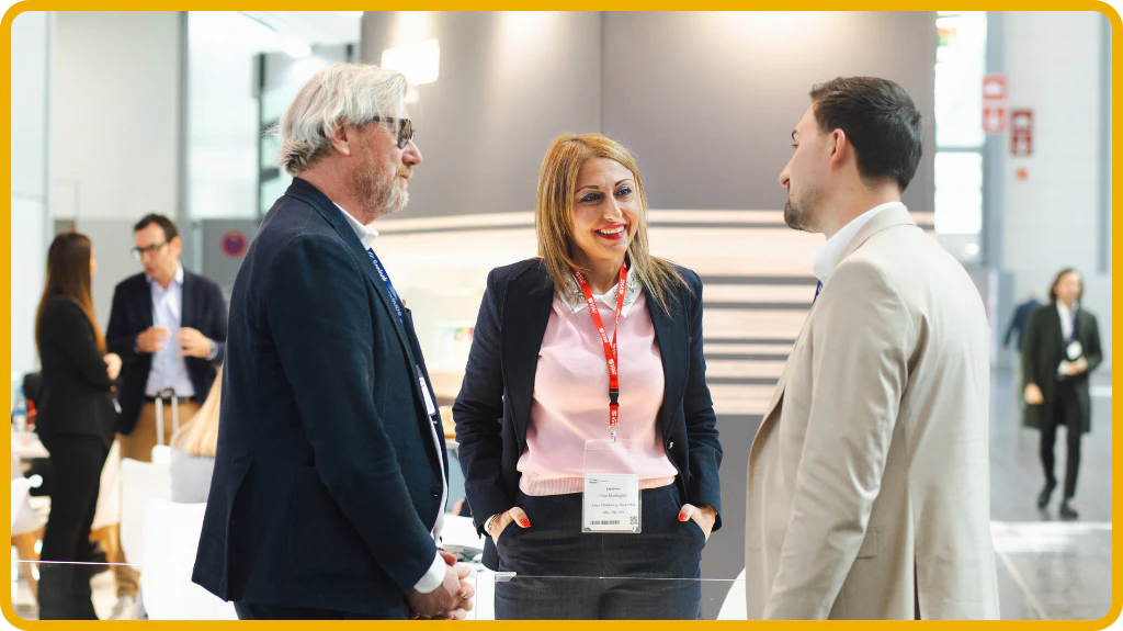 Exhibitors Speaking With Visitors at Tissue World