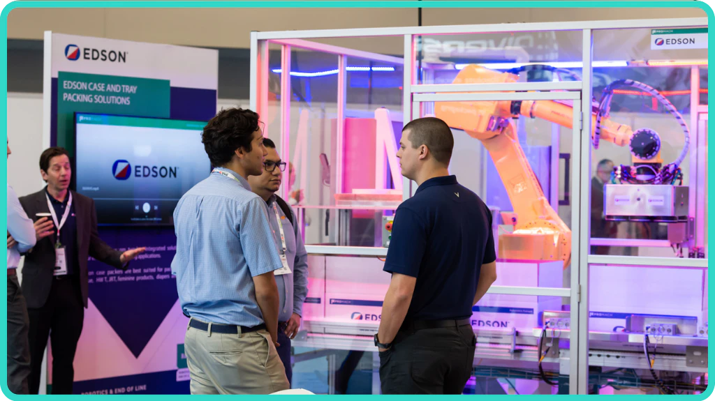 Exhibitors Speaking With Visitors at Tissue World