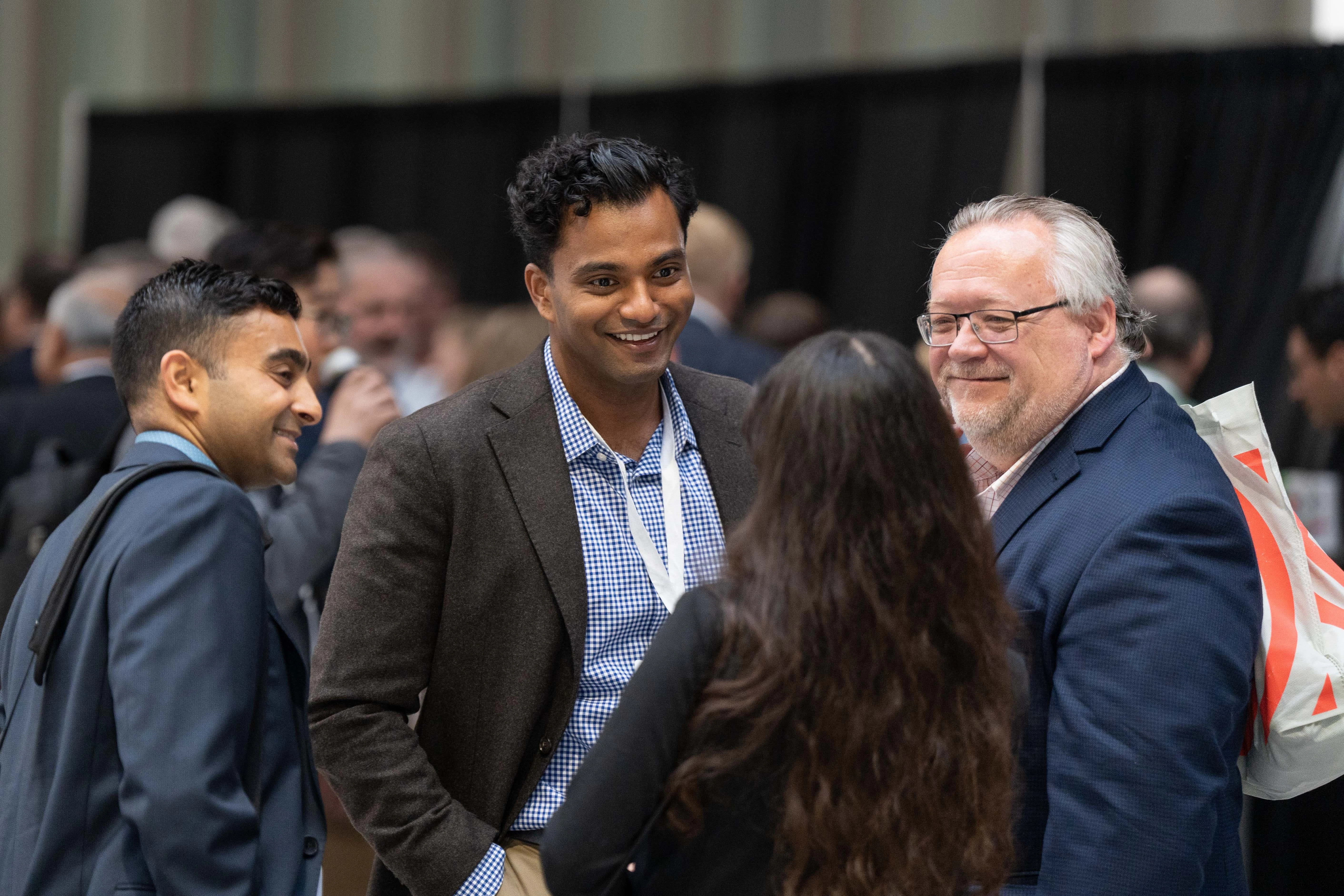 two young scientists, a man and a woman in a lab surrounded by scientific equipment