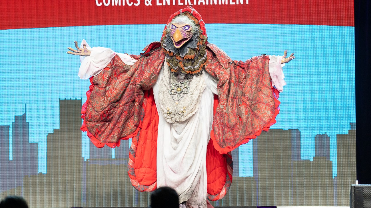 A Chamberlain from skekSil cosplayer stands onstage