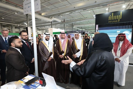 Business networking and discussions between government officials and industry leaders at Saudi Intermobility Expo 2024.