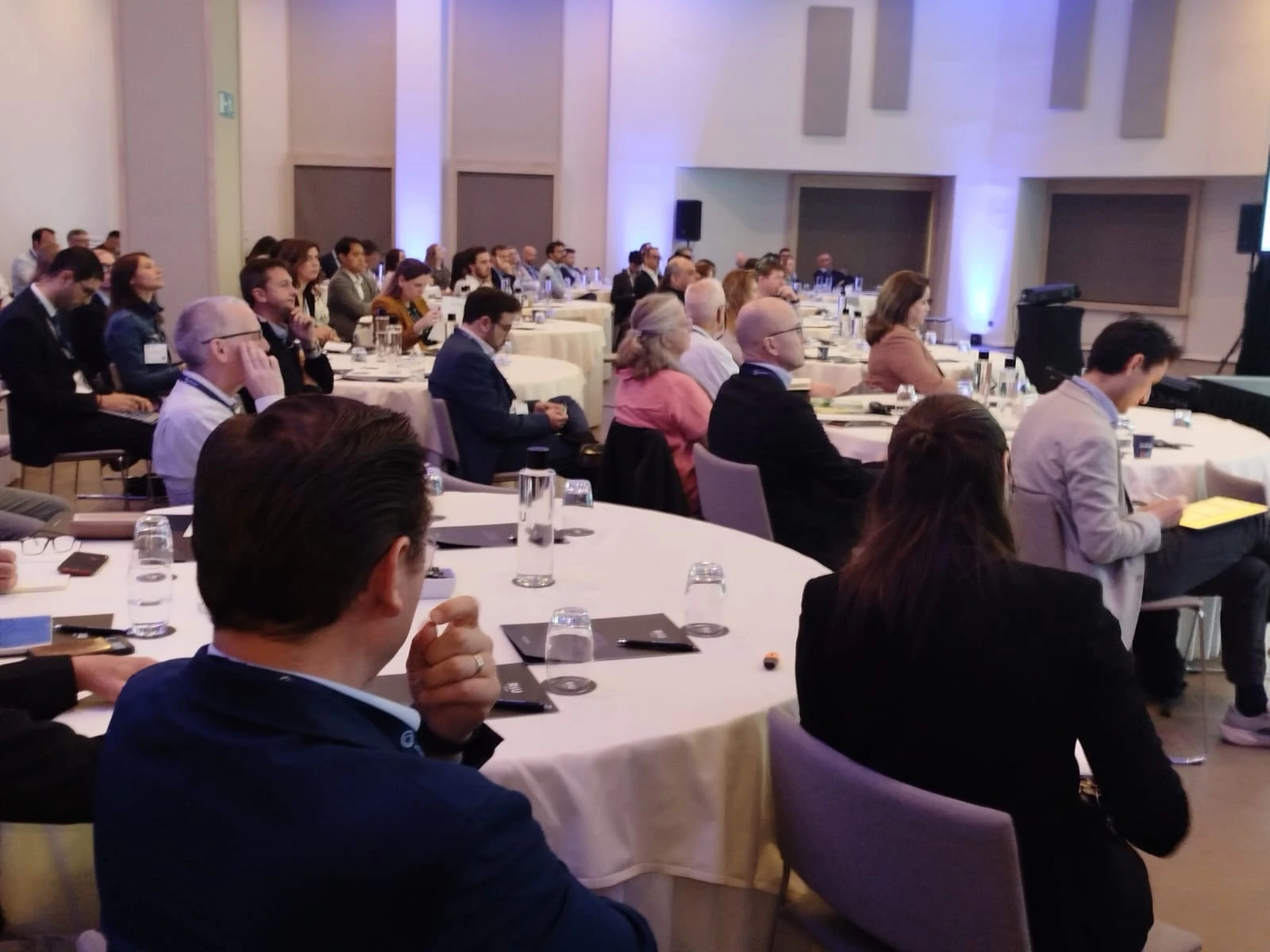 Conference room full of people at the New Ag International Annual, discussing innovations in specialty fertilisers and water-soluble solutions.