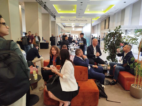 Attendees duscussing about specialty fertilisers and agritech advancements.