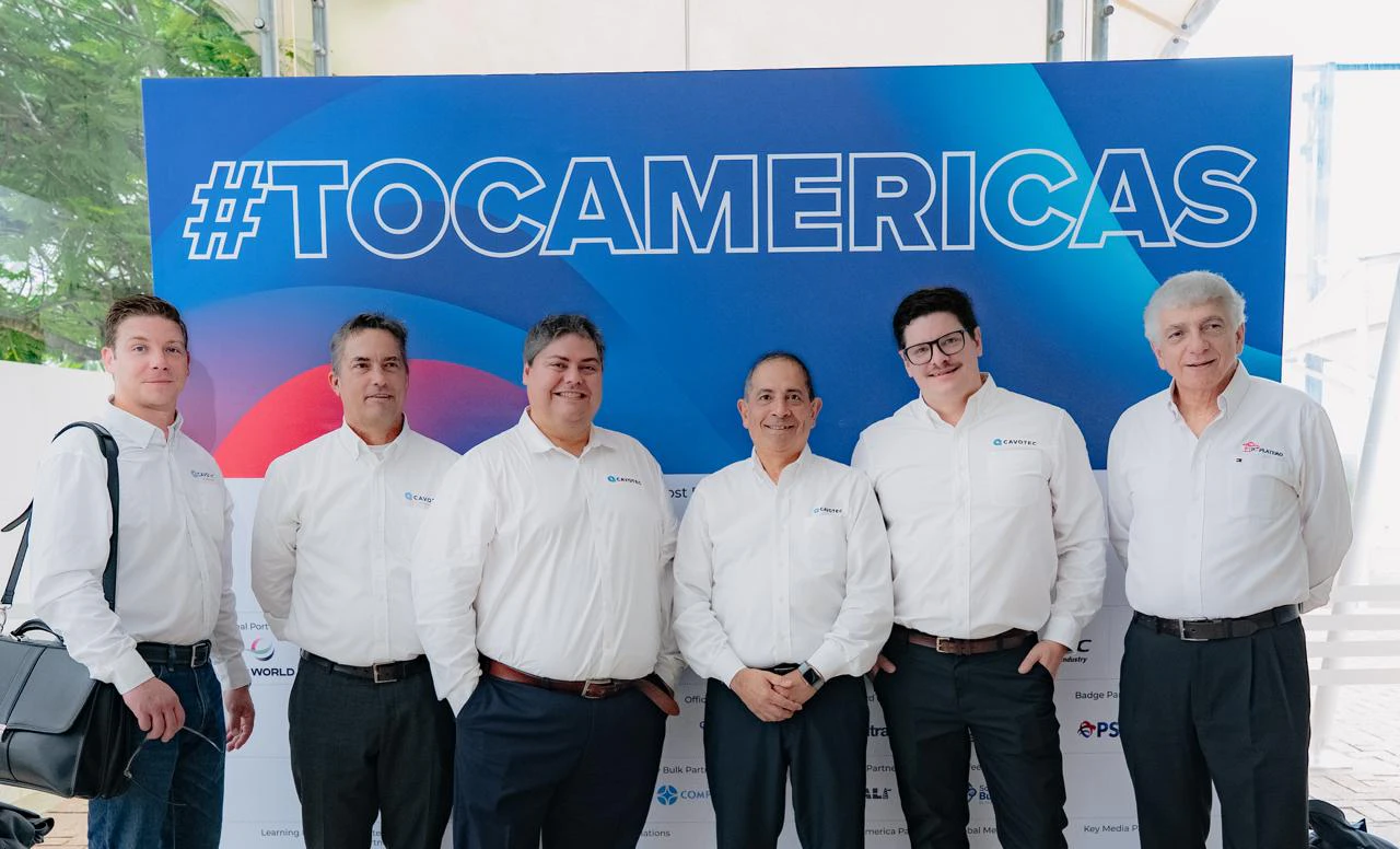 Audience seated during a session at the TOC Americas event.
