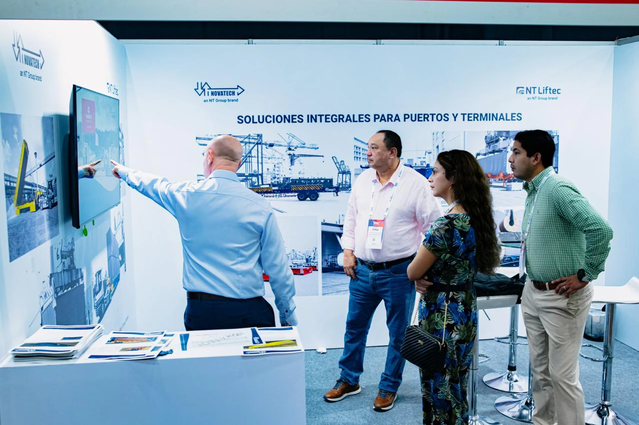 Participants discussing business at an event networking area.