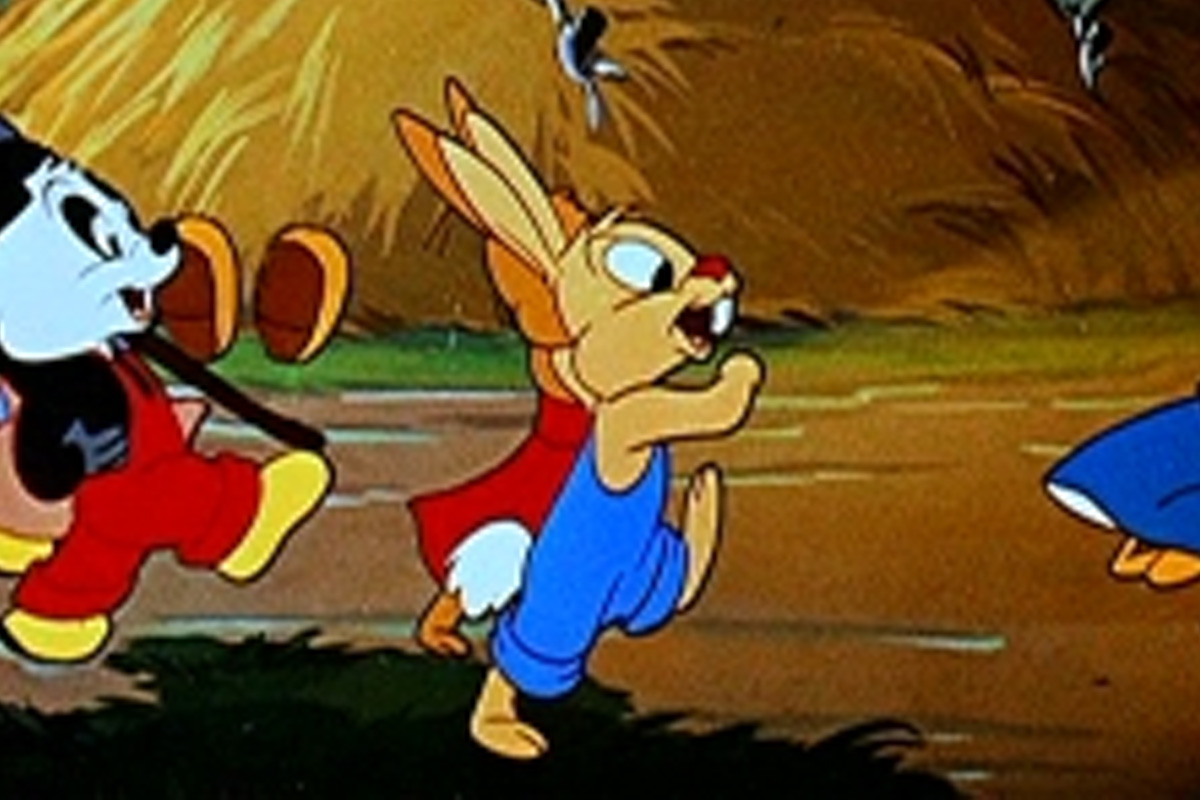 Even more unrecognizable, Oswald walks with light brown fur and blue overalls while smiling