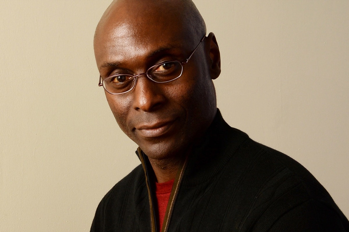 Lance Reddick smiles for a photo