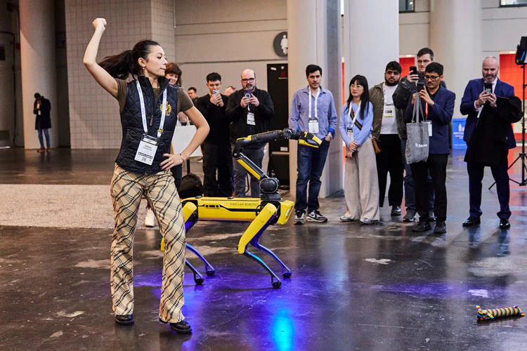 A Robot and a ballerina dance at The AI Summit