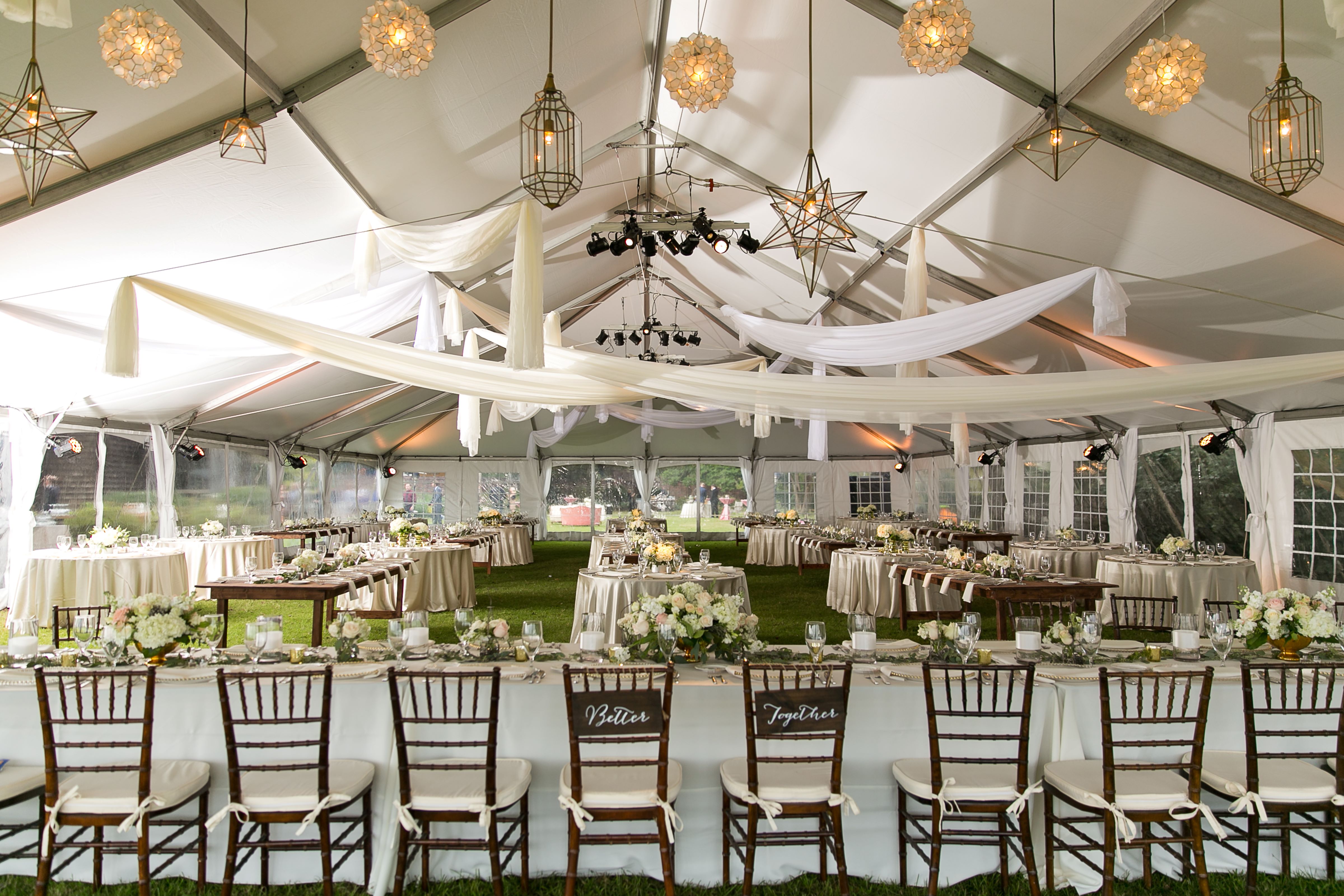 tent wedding venue decorated all in white