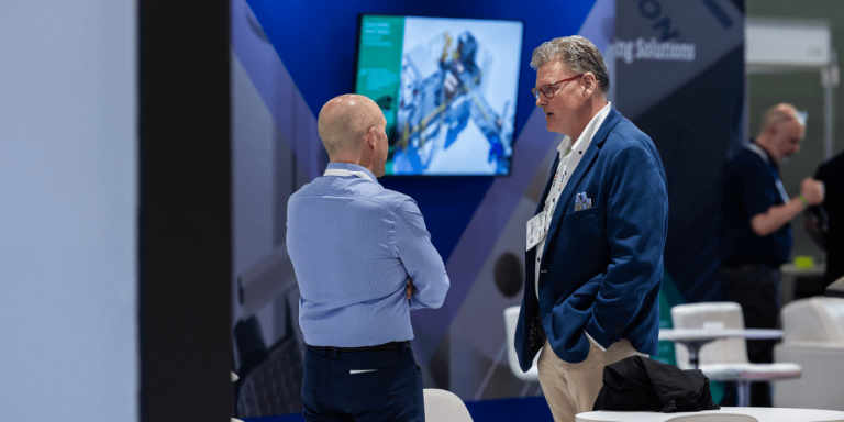 Two Associates Catching Up at Tissue World