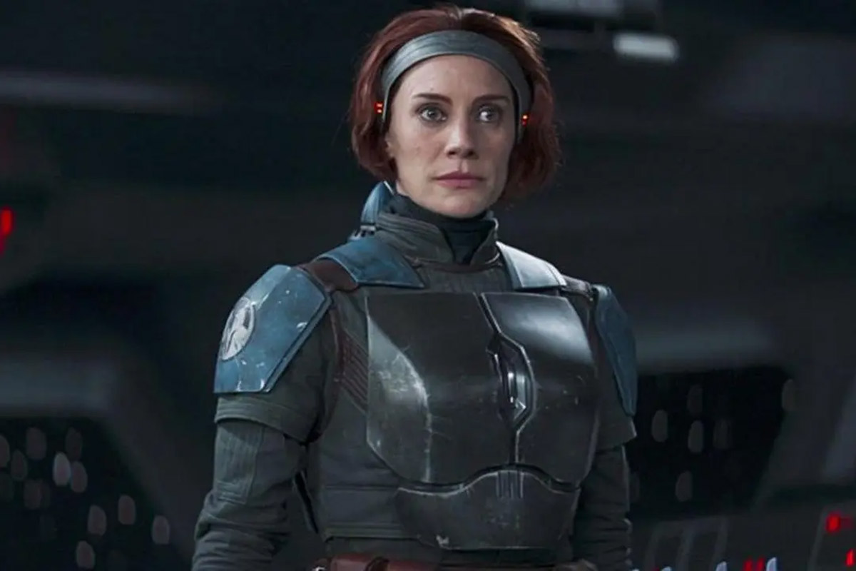 Bo-Katan unmasked looks startled at something off screen