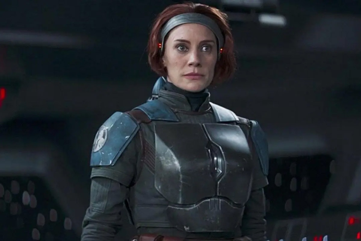 Bo-Katan unmasked looks startled at something off screen