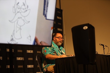Joe Wos guides the audience through a quick drawing lesson during Cartoon Academy.
