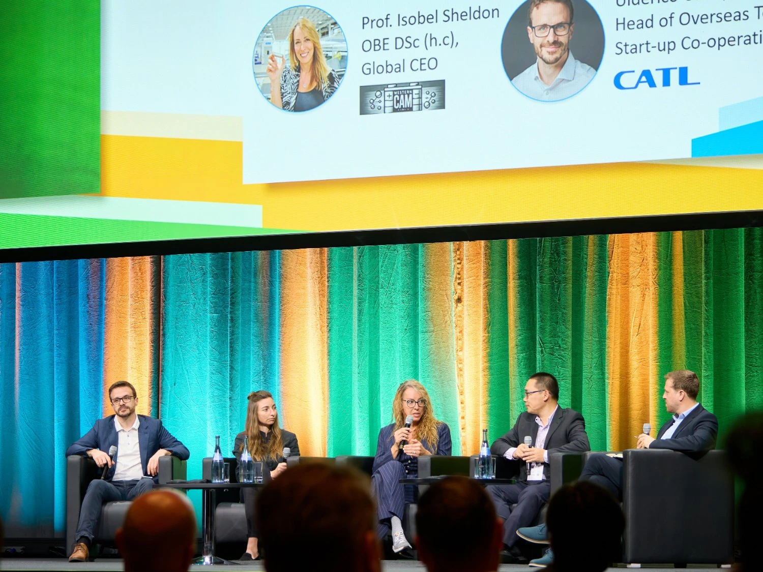 Panel members on stage at The Battery Show