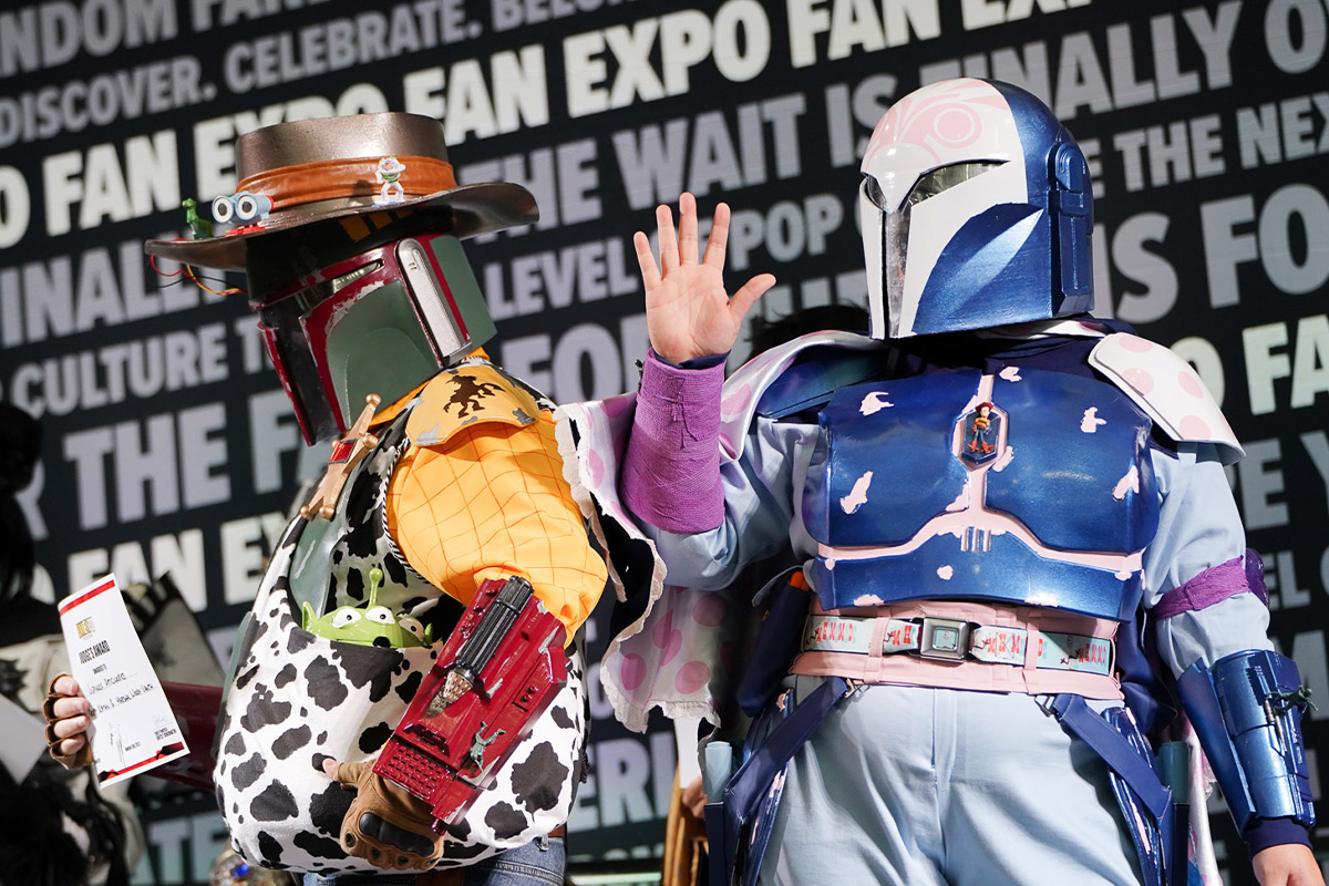 Cosplayers in Mandalorian x Toy Story armor pose for the camera