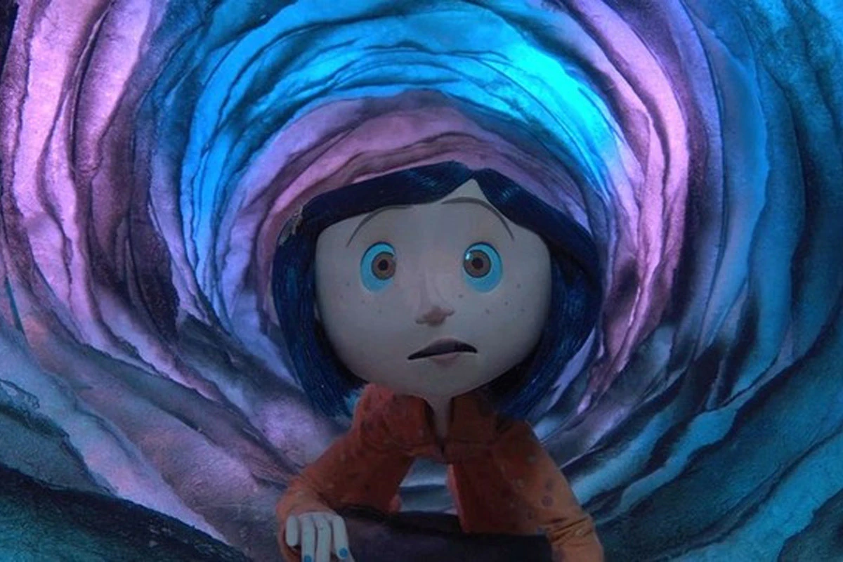 Animated character Corlaine crawls in a yellow rainjacket through a blue and purple tunnel;