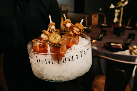 ice bucket with bloody mary cocktails