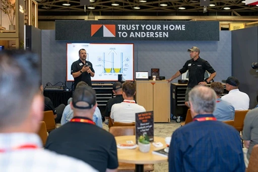 Building professionals attending a show floor session from Andersen