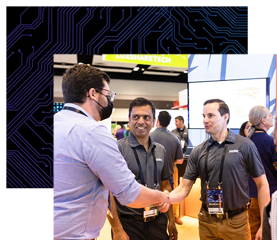 Exhibitor and attendee shaking hands