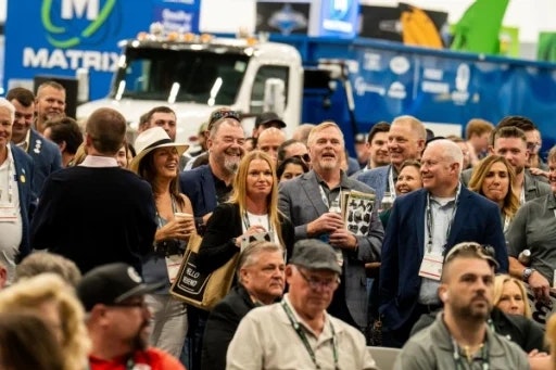 Attendees at WasteExpo visiting the EREF Charitable Auction