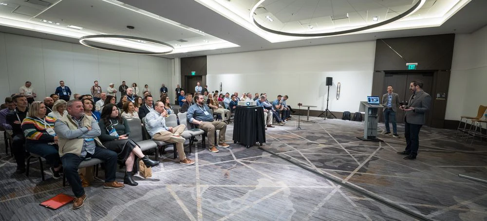 Full room of CRU attendees