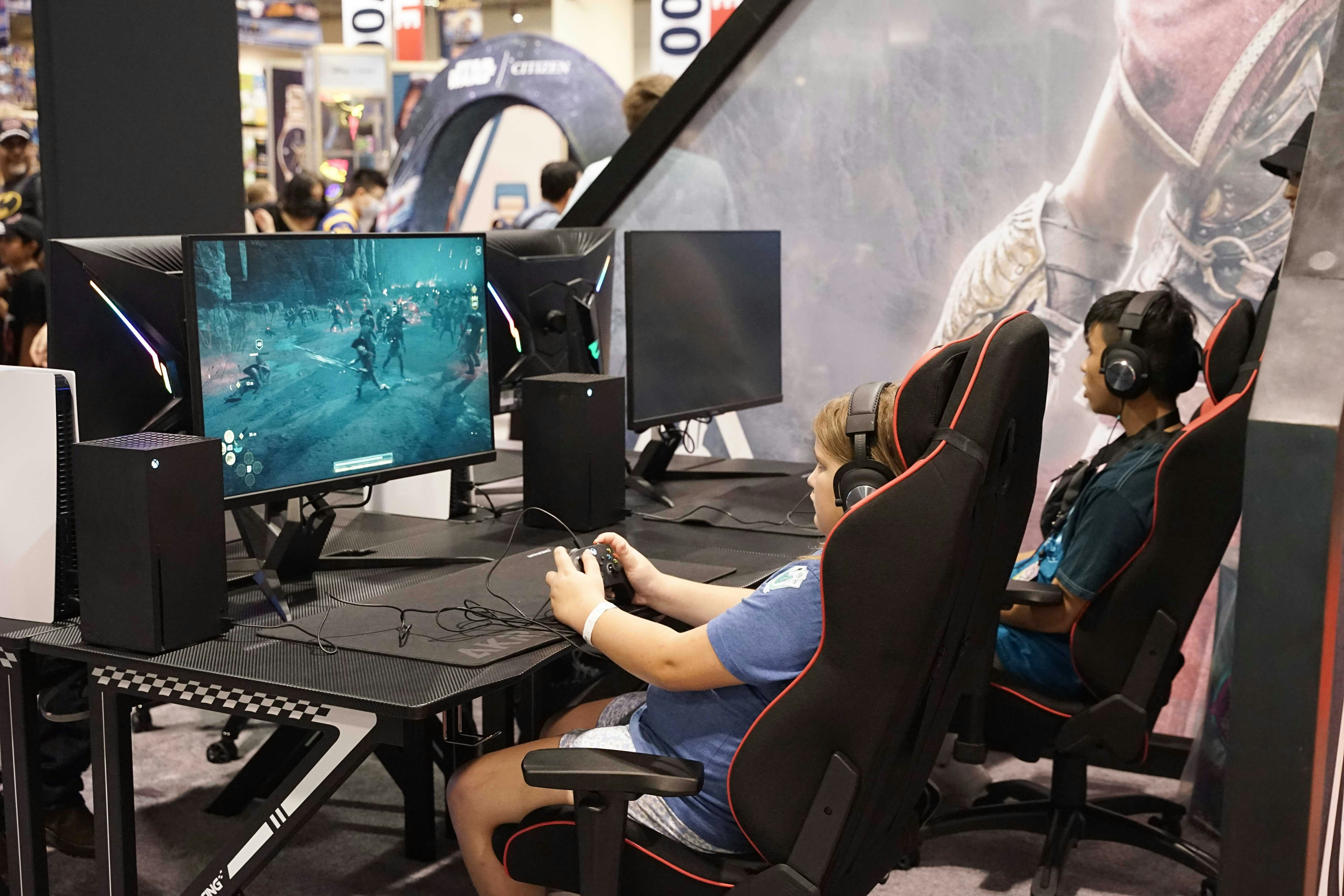 A fan plays a car simulation game