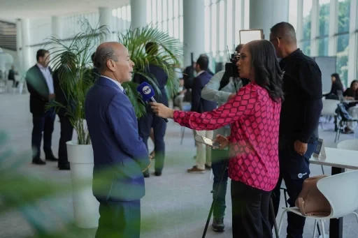 Media interview taking place at an industry event.